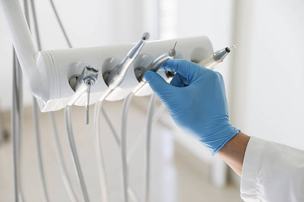 Professional Tooth Extraction technician working in Westport, NC